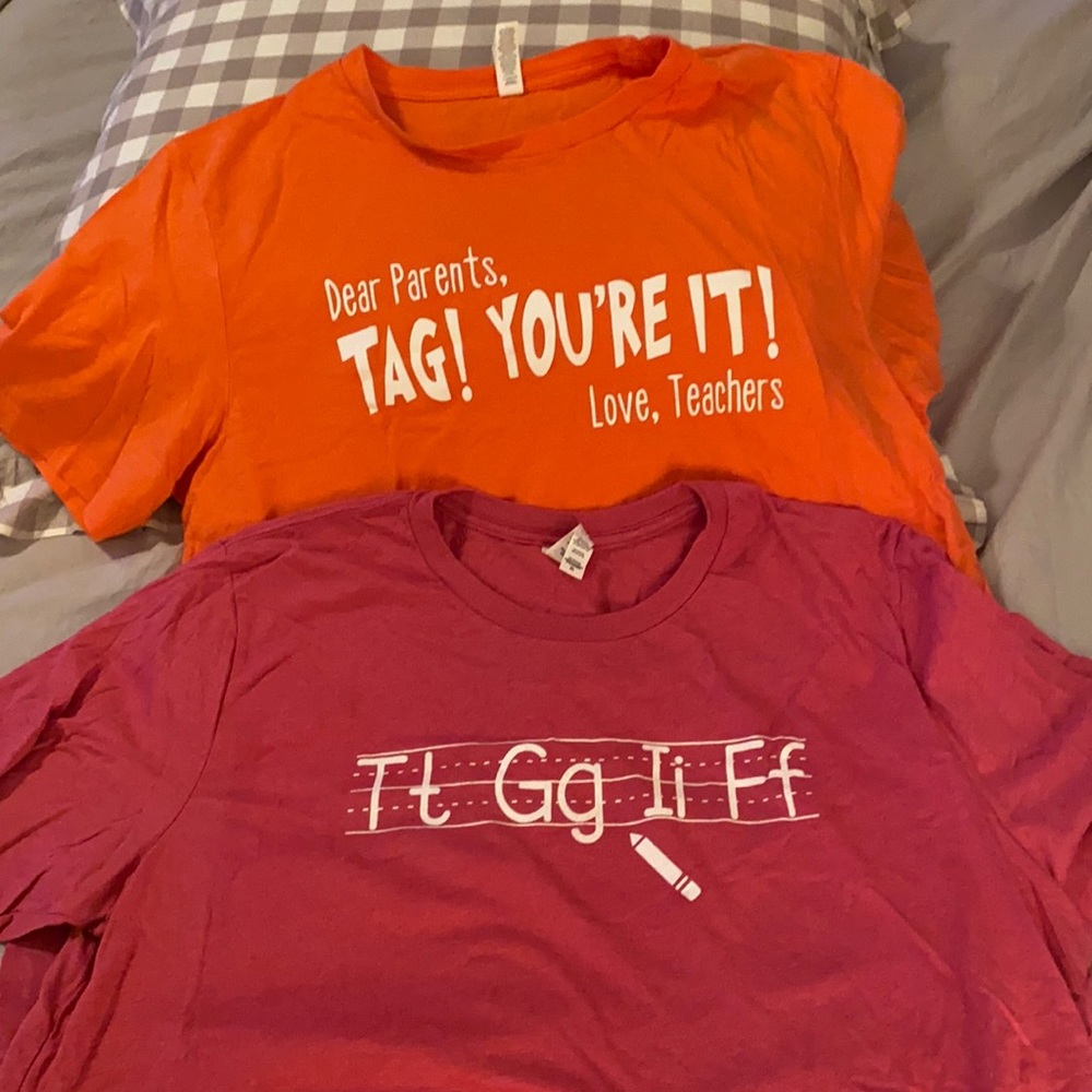 2 Bella Canvas Teacher shirts size XL. Coral and brushed Red colors.